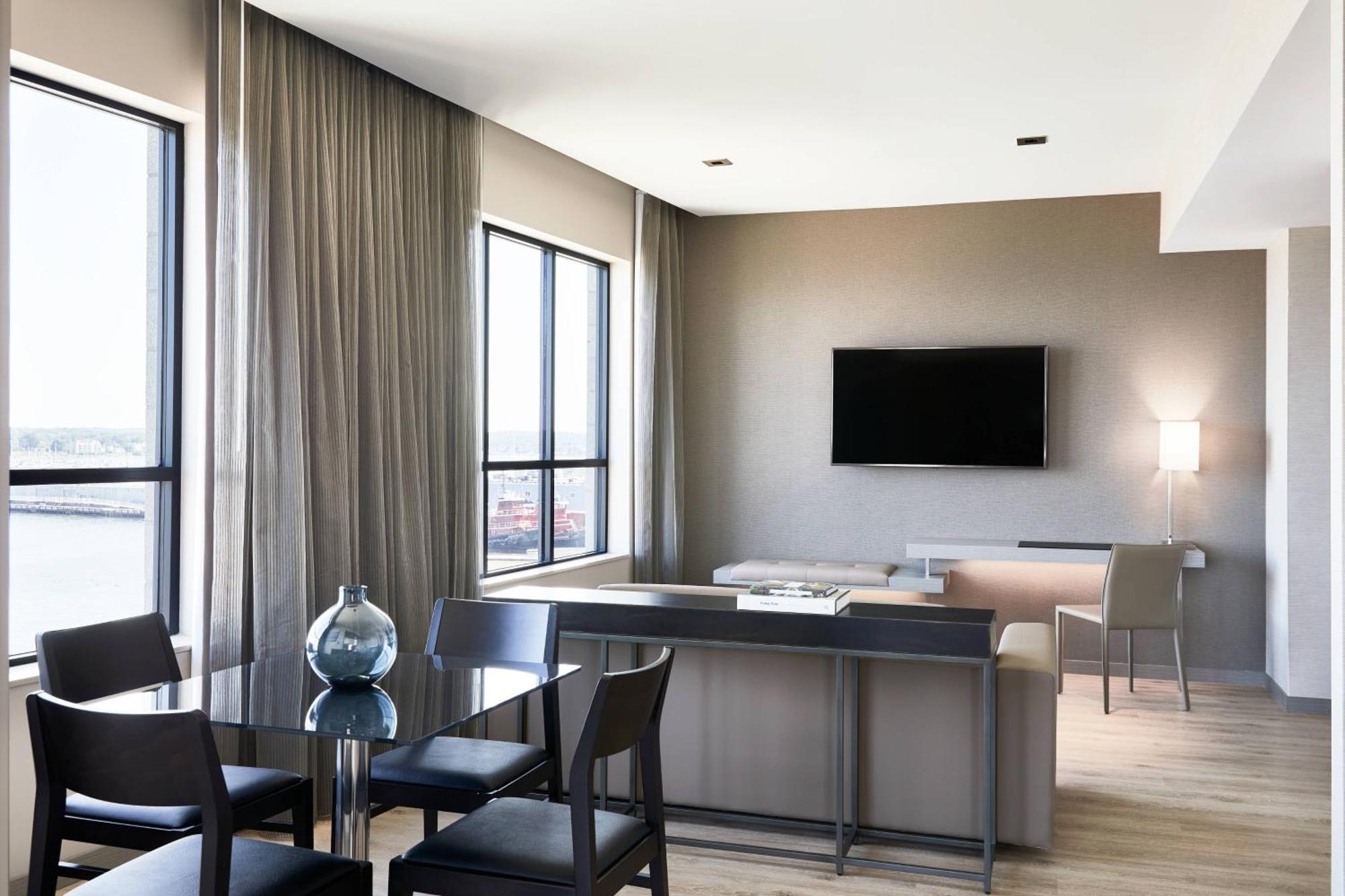 One-Bedroom King Suite Sofa Bed Water View Mobility Accessible Roll Shower